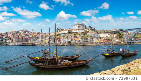 Boats with wine barrelsr in Porto Boats with wine barrelsr in Porto 72997331