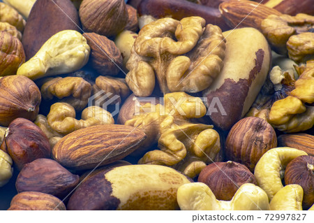Different kinds of nuts. Healthy and protein food Different kinds of nuts. Healthy and protein food 72997827