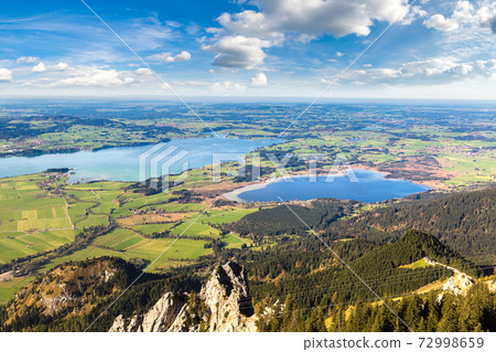 Green fields next to Neuschwanstein 72998659