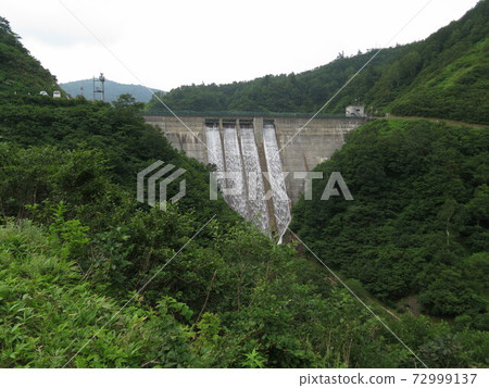 Release of Sukenobu Dam seen from Toyama Arimine Forest Road 72999137