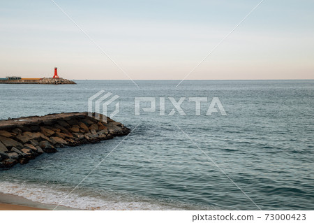 Yeongjin Beach and seawall in Gangneung, Korea 73000423