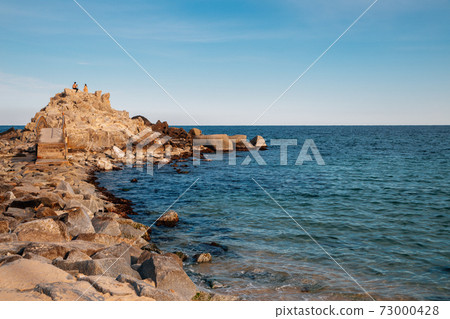 Sacheonjin Beach and rocks in Gangneung, Korea 73000428