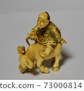 Netsuke / cow and old man 73000814