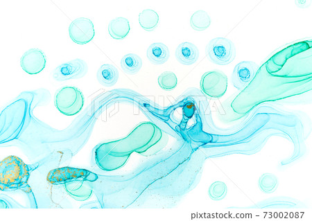 Chaotically splattered blue and green transparent ink drops on white background. Abstract watercolor texture with gold parts. 73002087