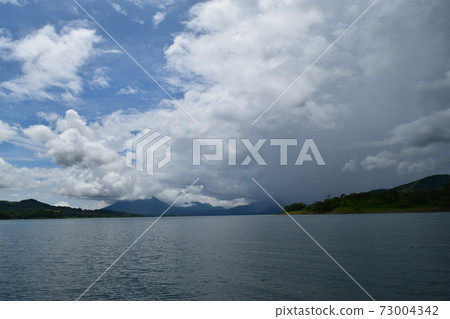 Rainforests and rivers at the foot of the Costa Rica Arenal volcano Rainforests and rivers at the foot of the Costa Rica Arenal volcano 73004342