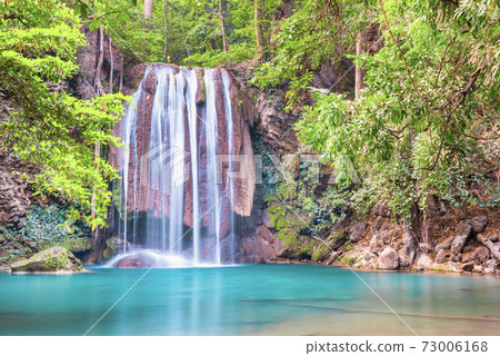 Waterfall and emerald lake in tropical forest, Erawan, Thailand Waterfall and emerald lake in tropical forest, Erawan, Thailand 73006168