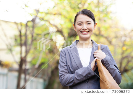 Businesswoman working young woman Businesswoman working young woman 73006273