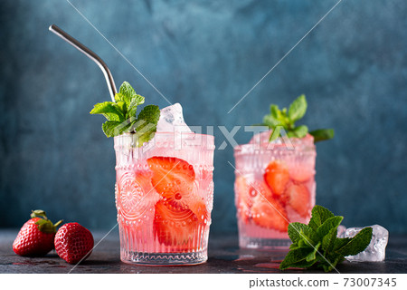 strawberry alcoholic cocktail with fresh mint strawberry alcoholic cocktail with fresh mint 73007345
