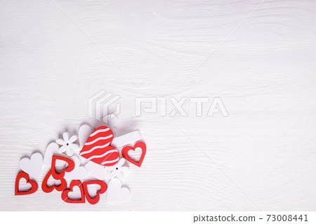 Red and white hearts on a white background. Valentine's day. Copy space 73008441