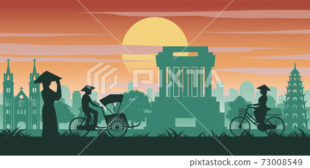 Vietnamese woman and man ride bicycle pass landmark of Vietnam,vintage color with sunset time tone 73008549