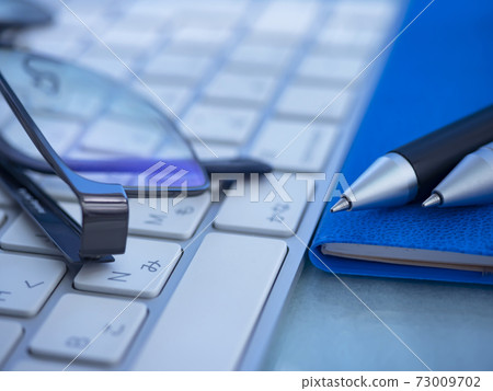 Business image · notebook · glasses · keyboard Business image · notebook · glasses · keyboard 73009702