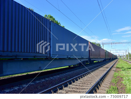 Cargo Containers Transportation On Freight Train By Railway. Cargo Containers Transportation On Freight Train By Railway. 73009717