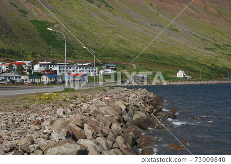 Traditional style houses that overlook the Tungata square in beautiful town of Isafjordur in Iceland Traditional style houses that overlook the Tungata square in beautiful town of Isafjordur in Iceland 73009840