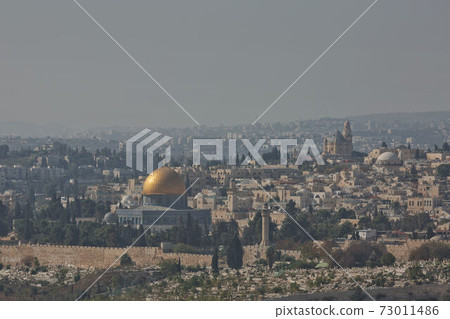 View of the old city of Jerusalem in Israel. The Dome of the Rock (Qubbet el-Sakhra) is one of the greatest of Islamic monuments, it was built by Abd el-Malik View of the old city of Jerusalem in Israel. The Dome of the Rock (Qubbet el-Sakhra) is one of the greatest of Islamic monuments, it was built by Abd el-Malik 73011486