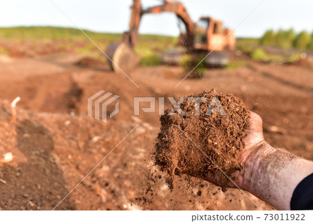 Peat Moss background. Peat moss industry harvests Peat Moss background. Peat moss industry harvests 73011922