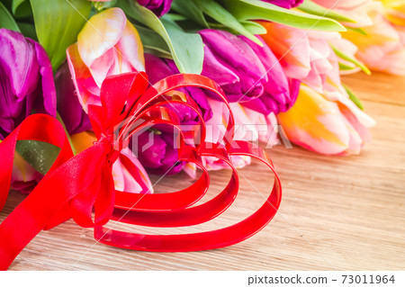 bouquet of multicolored tulip flowers with heart bouquet of multicolored tulip flowers with heart 73011964
