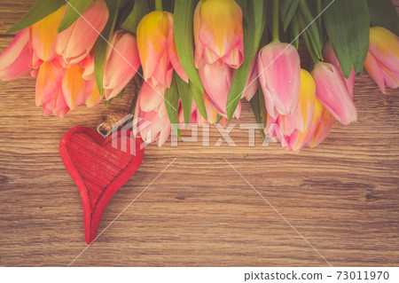 bouquet of multicolored tulip flowers with heart bouquet of multicolored tulip flowers with heart 73011970