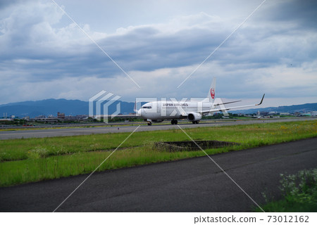 Itami Airport / Taxiing Airplane Itami Airport / Taxiing Airplane 73012162