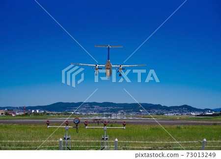 Landing plane and blue sky airport, Itami Airport 73013249