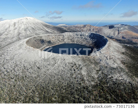 Aerial view of the Kirishima mountain range with snow Aerial view of the Kirishima mountain range with snow 73017136