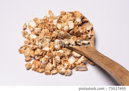 Sand ginger dried roots heap on white background Sand ginger dried roots heap on white background 73017495
