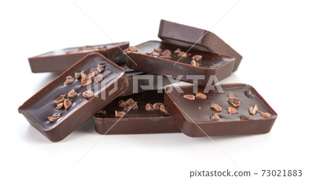 dark chocolate squares with roasted pieces of cocoa dark chocolate squares with roasted pieces of cocoa 73021883