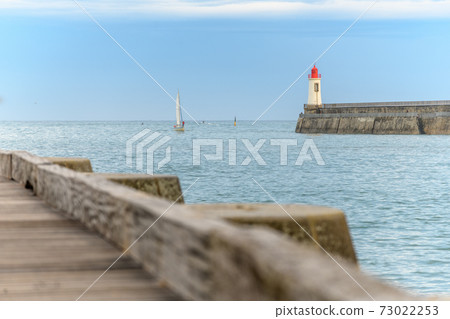 Lighthouse of grande jetee in les Sables d'Olonne in France. 73022253