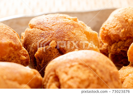 Sata andagi (sweets known as one of Okinawa's specialties). Sata andagi (sweets known as one of Okinawa's specialties). 73023876