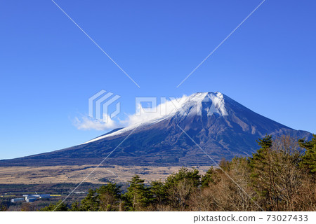 Mt. Fuji with snow makeup and clouds Mt. Fuji with snow makeup and clouds 73027433