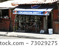 Stalls in La Paz, the capital of Bolivia (full of military personnel) 73029275
