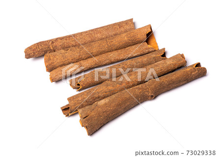Cinnamomum tamala barks heap on a white background 73029338