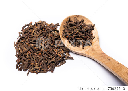 Cinnamomum cassia presl barks heap on a white background Cinnamomum cassia presl barks heap on a white background 73029340