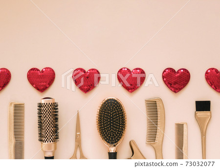 Valentines day template with hairdressing tools and hearts. Gold hair salon accessories. 73032077