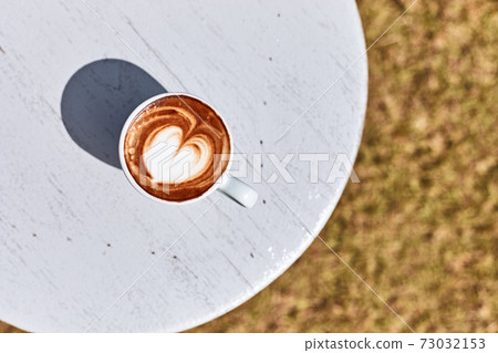 a little cup of piccolo latte 73032153