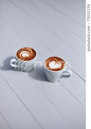 a little cup of piccolo latte 73032159