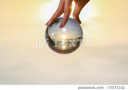 Catch the crystal ball with her finger Catch the crystal ball with her finger 73035182