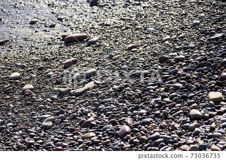 Small rocks beach shore 73036735