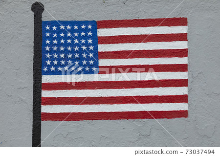 Flag of the United States of America, painted on a wall 73037494