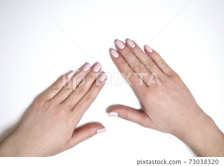 Female manicure on a white background. Simple Female manicure on a white background. Simple 73038320