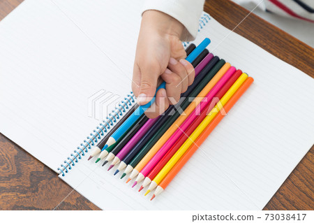 Toddler with colored pencils Toddler with colored pencils 73038417