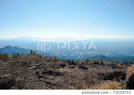 Kirishima Onamiike mountain trail seen from Karasuhatake and Kirishima city area Kirishima Onamiike mountain trail seen from Karasuhatake and Kirishima city area 73038733