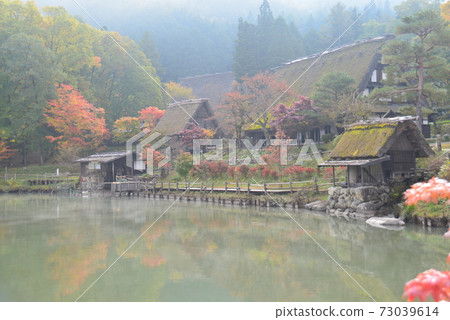Hida Village in the morning mist 73039614