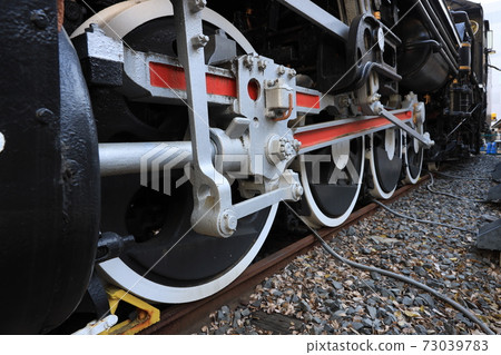 Driving wheel of D51 steam locomotive of National Science Museum in Ueno, Taito-ku, Tokyo 73039783