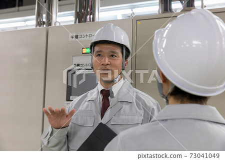 People working in the factory 73041049