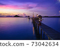 Wooden bridge at dusk 73042634