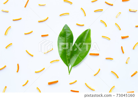 Orange peels leaves on white background. top view Orange peels leaves on white background. top view 73045160