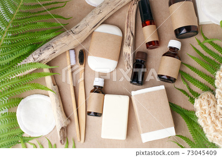 Natural eco bamboo toothbrush, coconut soap, solid shampoo, , bathroom essentials in sustainable lifestyle. zero waste concept, self-care focused background, mock up, copy space, banner Natural eco bamboo toothbrush, coconut soap, solid shampoo, , bathroom essentials in sustainable lifestyle. zero waste concept, self-care focused background, mock up, copy space, banner 73045409