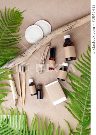 Natural eco bamboo toothbrush, coconut soap, solid shampoo, , bathroom essentials in sustainable lifestyle. zero waste concept, self-care focused background, mock up, copy space, banner Natural eco bamboo toothbrush, coconut soap, solid shampoo, , bathroom essentials in sustainable lifestyle. zero waste concept, self-care focused background, mock up, copy space, banner 73045412