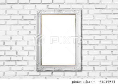 white frame on white brick wall white frame on white brick wall 73045613