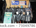 In the city of Potosi, a local city in Bolivia (mannequins) 73049786